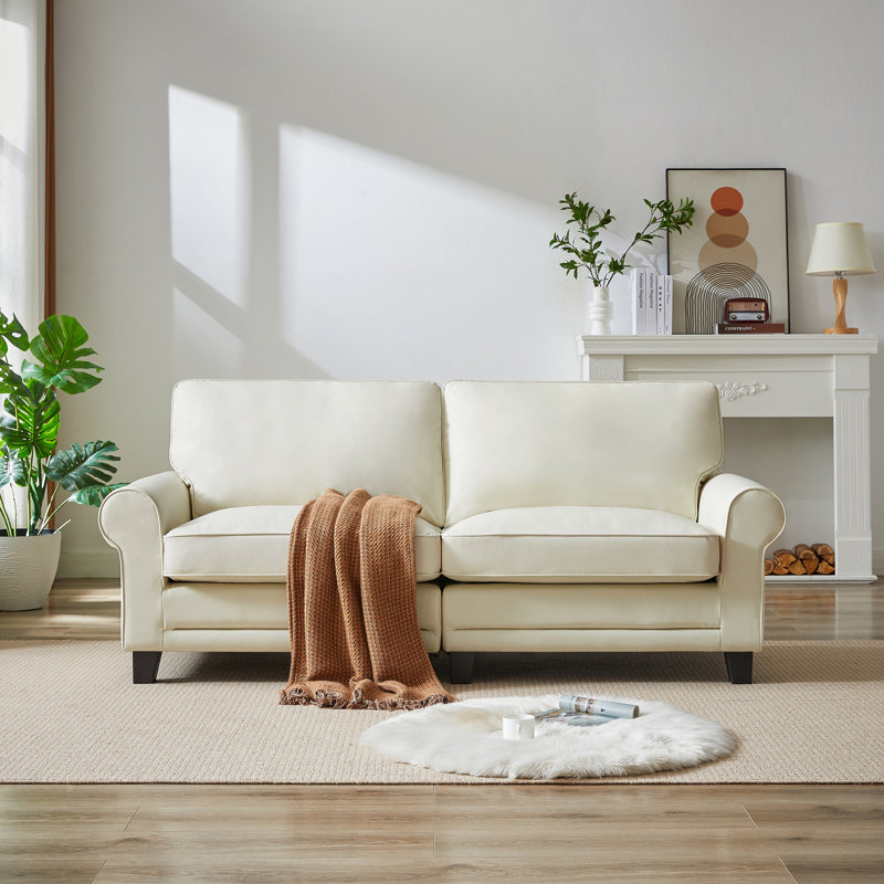 Beige rolled arm sofa discount